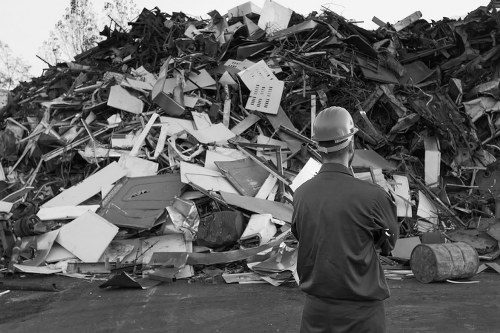 Workers safely managing construction debris